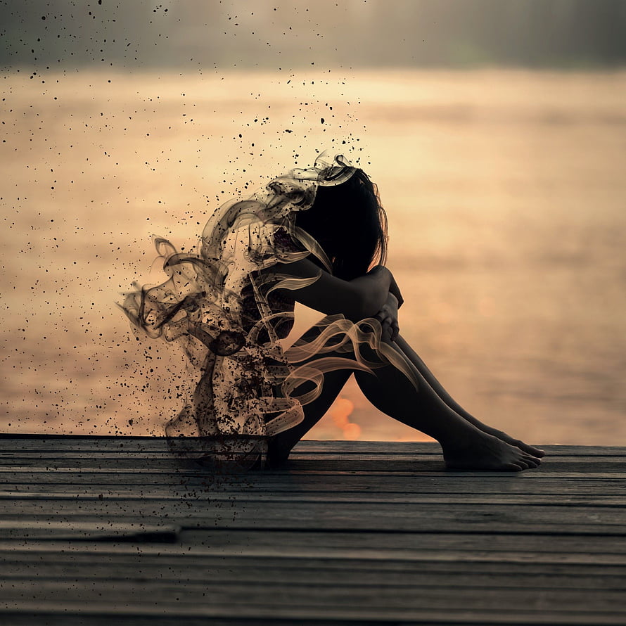 Silhouette of a girl dissolving into smoke on a wooden dock at sunset HD phone wallpaper