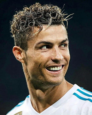 Cristiano Ronaldo Smiling Portrait in White and Blue Football Kit HD phone wallpaper