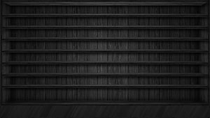 Dark Charcoal Wooden Shelving Unit With Empty Horizontal Compartments HD wallpaper