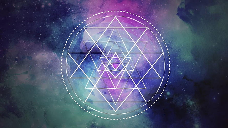 Sri Yantra Sacred Geometry Pattern Set Against a Cosmic Nebula Background HD wallpaper