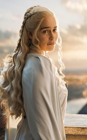 Emilia Clarke as Daenerys Targaryen in Game of Thrones with braided silver hair and white gown HD phone wallpaper