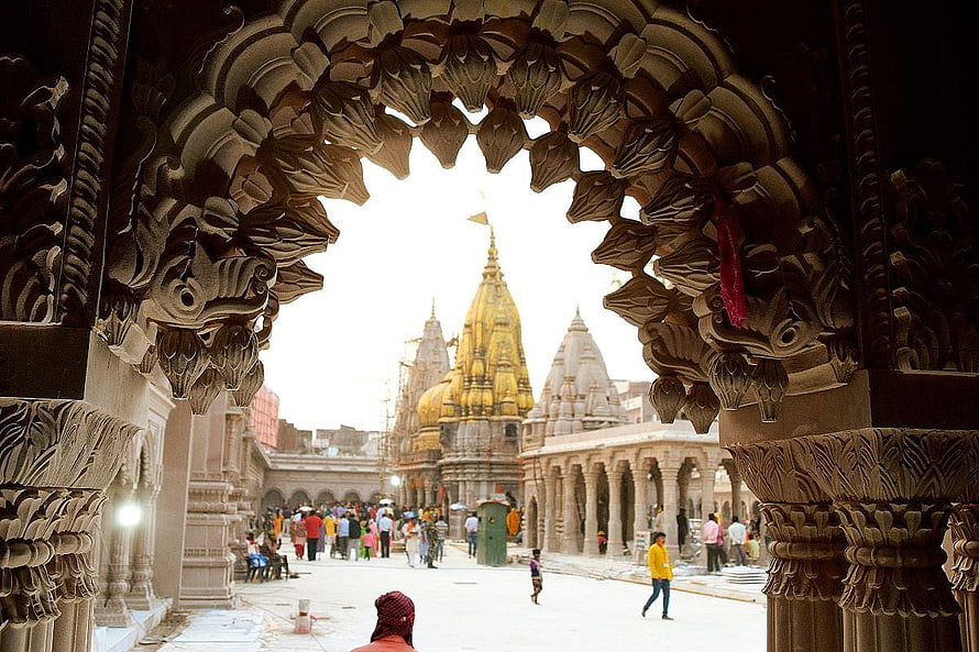 Kashi Vishwanath Temple View Through Intricate Carved Archway in Varanasi HD wallpaper