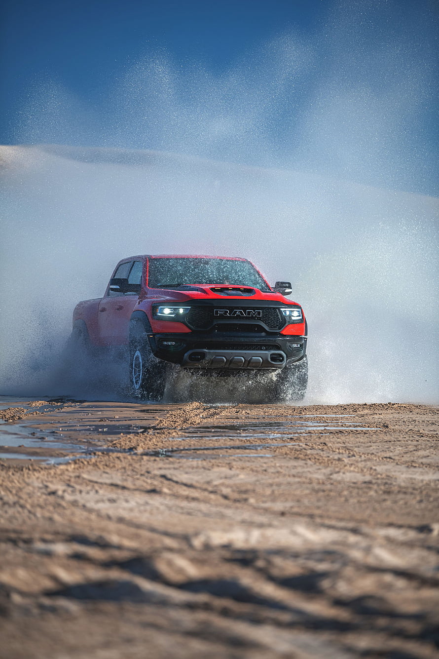 Red Ram 1500 TRX Off-Road Truck Splashing Through Water on a Desert Trail HD phone wallpaper