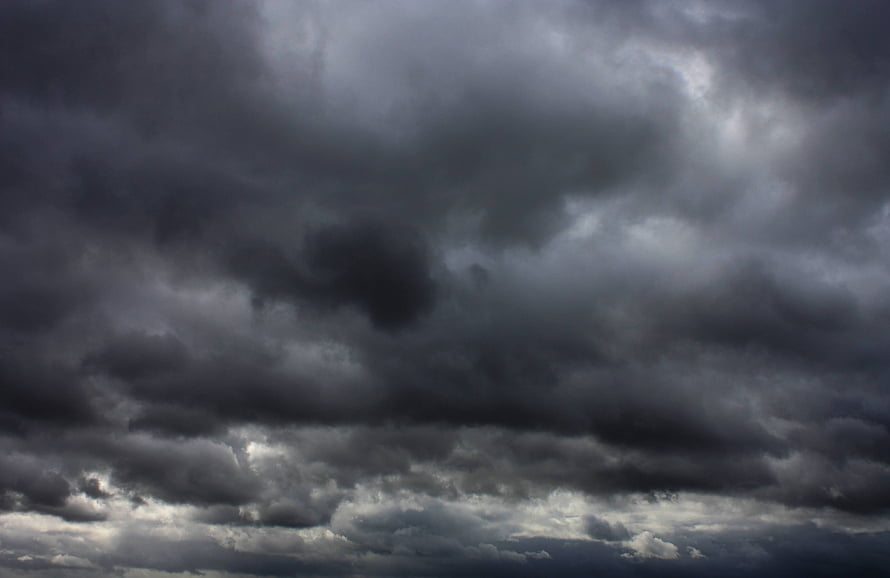 Dramatic Dark Storm Clouds Filling the Sky with Heavy Overcast Weather HD wallpaper